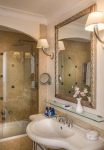 a bathroom with a sink and a shower at Grand Hotel Timeo, A Belmond Hotel, Taormina in Taormina