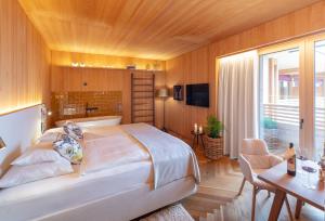 TV a/nebo společenská místnost v ubytování MalisGarten Green Spa Hotel