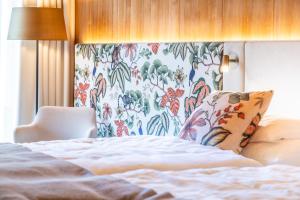 Posteľ alebo postele v izbe v ubytovaní MalisGarten Green Spa Hotel