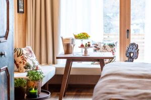 Posteľ alebo postele v izbe v ubytovaní MalisGarten Green Spa Hotel