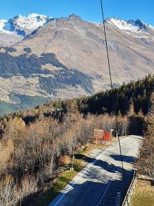 a view of a mountain from a ski lift at les 3 marmottes - Les Arolles in Bourg-Saint-Maurice