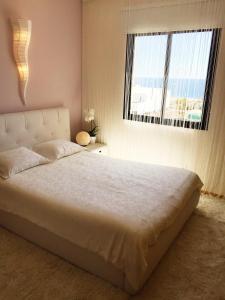 Posteľ alebo postele v izbe v ubytovaní Apartment VIParaiso
