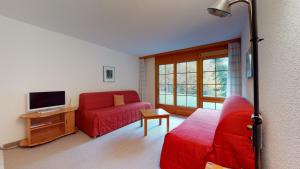 TV a/nebo společenská místnost v ubytování Mountain Escape Apartment for 5 in Leukerbad
