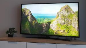 a flat screen tv sitting on top of a shelf at Apartament Elvira, Grunwaldzka 12C in Pobierowo