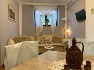 Televízia a/alebo spoločenská miestnosť v ubytovaní Fresh Apartments Dar Orlic
