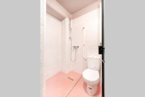 a bathroom with a toilet and a shower at Marvellous Design Studio Old Town in Bucharest