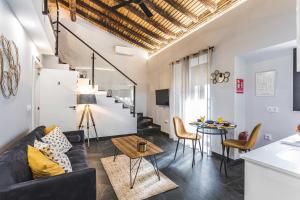 Χώρος καθιστικού στο Apartamentos Cáceres Central Suites "Torres de Cáceres"