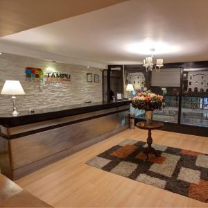 The lobby or reception area at Tampu Hotel