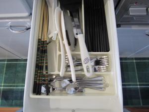 a drawer full of utensils in a compartment at Amami Lucky House - Vacation STAY 07619v in Amami