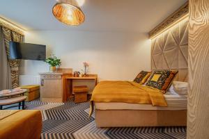Posteľ alebo postele v izbe v ubytovaní Serce Tatr Residence Zakopane - blisko Krupówek