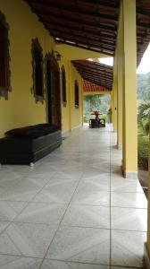 Fotografija v galeriji nastanitve Casa com Flores v mestu Pedra Azul