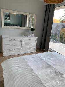Posteľ alebo postele v izbe v ubytovaní Apartament "OldMountain" Olimpijska 1C 1
