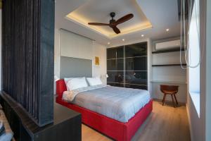 Uma cama ou camas num quarto em Akasha Loft