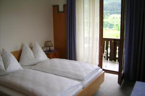 Llit o llits en una habitació de Haus Alpenfriede
