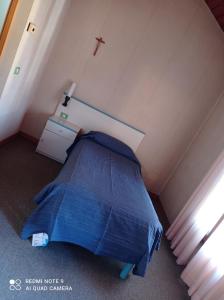 Ein Bett oder Betten in einem Zimmer der Unterkunft Locanda Alla Stazione