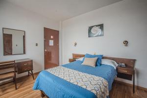 Postel nebo postele na pokoji v ubytování Hotel Palacio + 37 fotografií