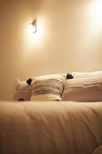 
A bed or beds in a room at Margaret River Retreat
