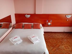 Posteľ alebo postele v izbe v ubytovaní Hostal Sauna Water Palace