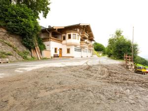 a house on the side of a dirt road at Magnificent Apartment in Mittersil with Sauna in Mittersill