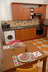 a kitchen with a table with two plates on it at Just BE that´s enough!! in Prague
