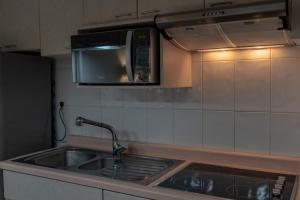 Dapur atau dapur kecil di Suites Arquimedes 33