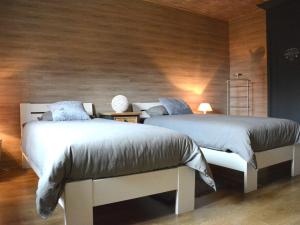 Ένα ή περισσότερα κρεβάτια σε δωμάτιο στο Chic Holiday Home with Garden