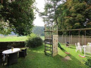 Kawasan permainan kanak-kanak di Splendid Mansion in Bastogne with Fenced Garden