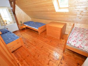 Katil atau katil-katil dalam bilik di Cottage in Liberec with Sauna and Ski Nearby