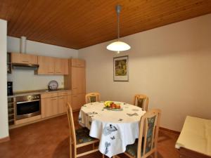 a kitchen with a table with fruit on it at Country holiday home in Damshagen with sauna in Damshagen