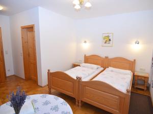 Posteľ alebo postele v izbe v ubytovaní Spacious Apartment in Sch nsee with Sauna