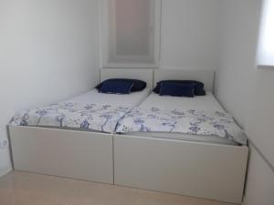 Posteľ alebo postele v izbe v ubytovaní Apartments Nautica II