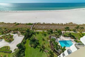 an aerial view of a resort and the beach at Admiralty House 1705S in Marco Island