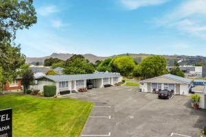 arial view of a building with a parking lot at Arcadia Motel in Christchurch