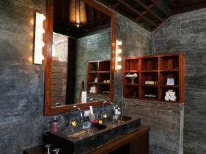 A bathroom at Majapahit Beach Villas by Nakula