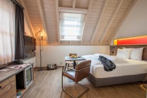 Voodi või voodid majutusasutuse Boutiquehotel Thessoni Classic & Self service Residence Home Zürich toas