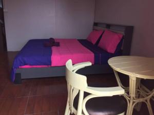 Postel nebo postele na pokoji v ubytování SMILE HOME GUESTHOUSE