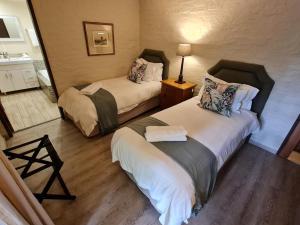 Letto o letti in una camera di Migrate Portfolio