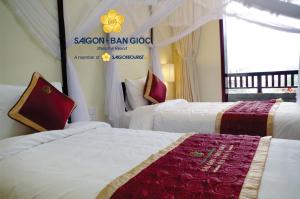Voodi või voodid majutusasutuse Sài Gòn - Bản Giốc Resort toas