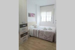Posteľ alebo postele v izbe v ubytovaní BONITO APARTAMENTO