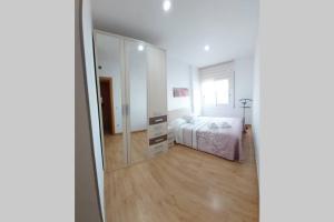 Posteľ alebo postele v izbe v ubytovaní BONITO APARTAMENTO