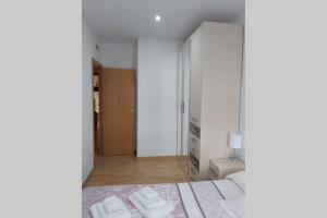 Posteľ alebo postele v izbe v ubytovaní BONITO APARTAMENTO
