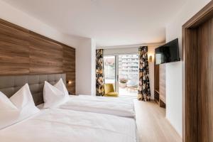 Katil atau katil-katil dalam bilik di Boutique Hotel Zach