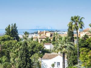 a view of a resort town with palm trees at VACATION MARBELLA I El Dorado, Newly Renovated Flat, Beach, Golf lovers and Views in Marbella