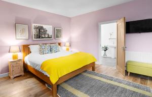 Cama o camas de una habitación en The Swan Inn Letton