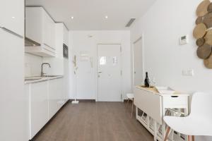 A kitchen or kitchenette at Juan de Padilla Boutique by Nagoa Homes