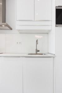 A kitchen or kitchenette at Juan de Padilla Boutique by Nagoa Homes
