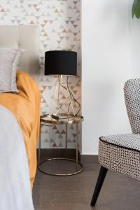 A television and/or entertainment centre at Juan de Padilla Boutique by Nagoa Homes
