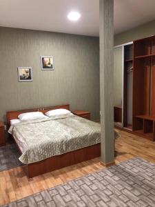 Cama o camas de una habitación en Guest House na Velikoy