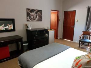 Letto o letti in una camera di Migrate Portfolio