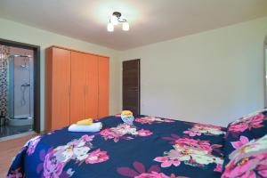 Postel nebo postele na pokoji v ubytování House Roza 2065